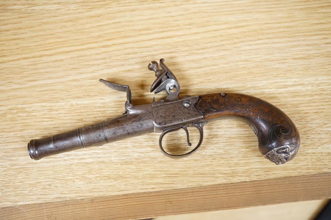 A Queen Anne style box lock flintlock travelling pistol, with turn off cannon barrel, 6cm, frame engraved; T. Lane, sliding trigger guard safety, rounded walnut grip with silver wire inlay and grotesque silver butt cap (